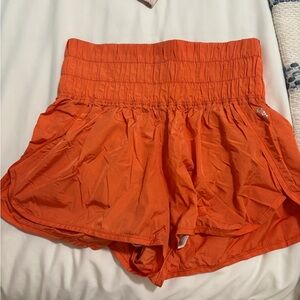 Free People Orange Athletic Shorts with High-Waisted Design